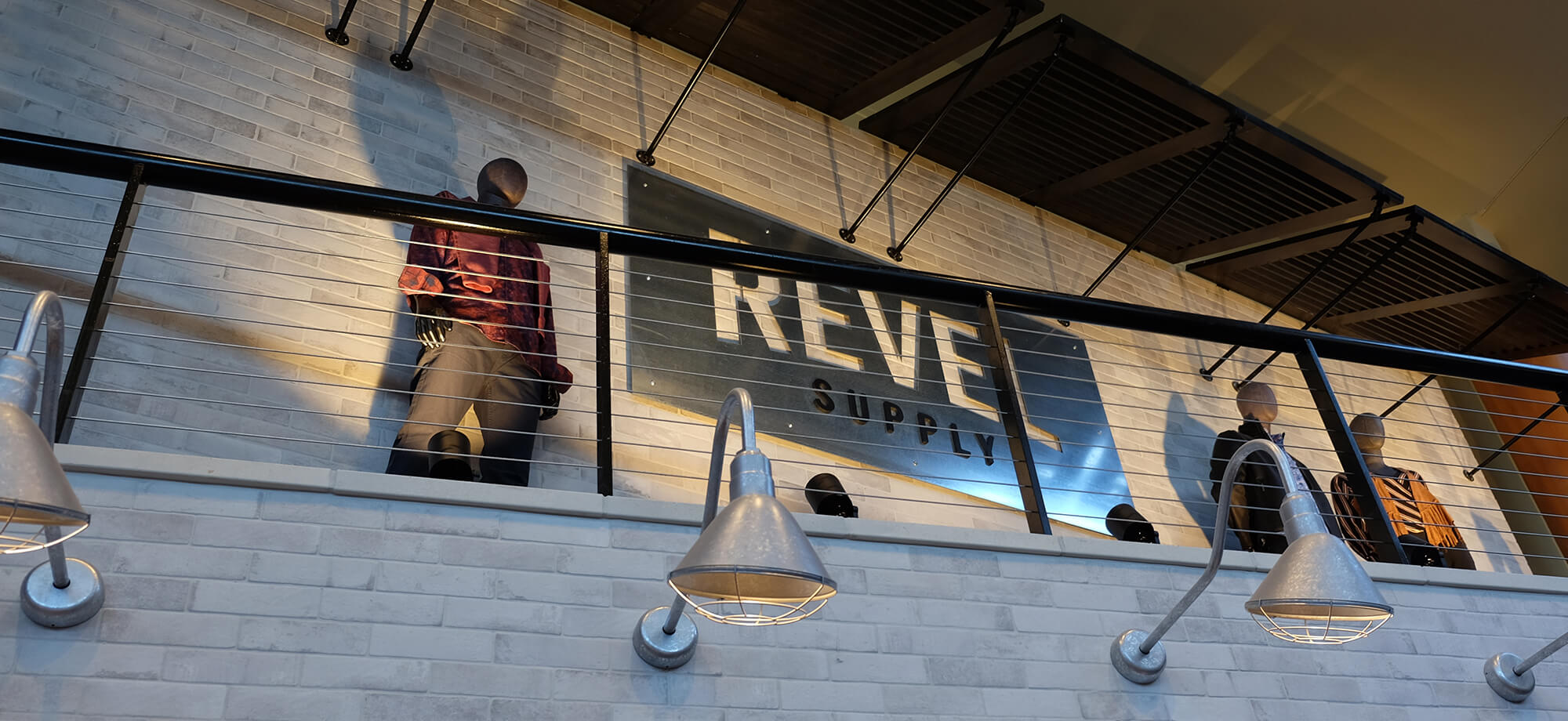 Revel Supply sign on balcony
