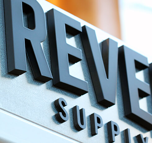 Revel sign close detail