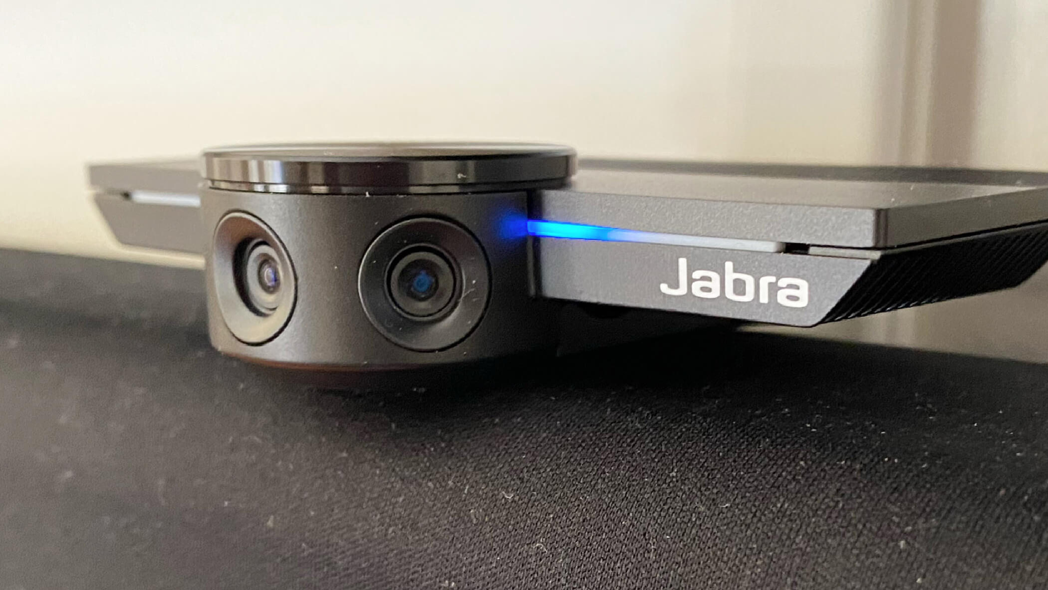 the jabra panacast device on our conference room wall