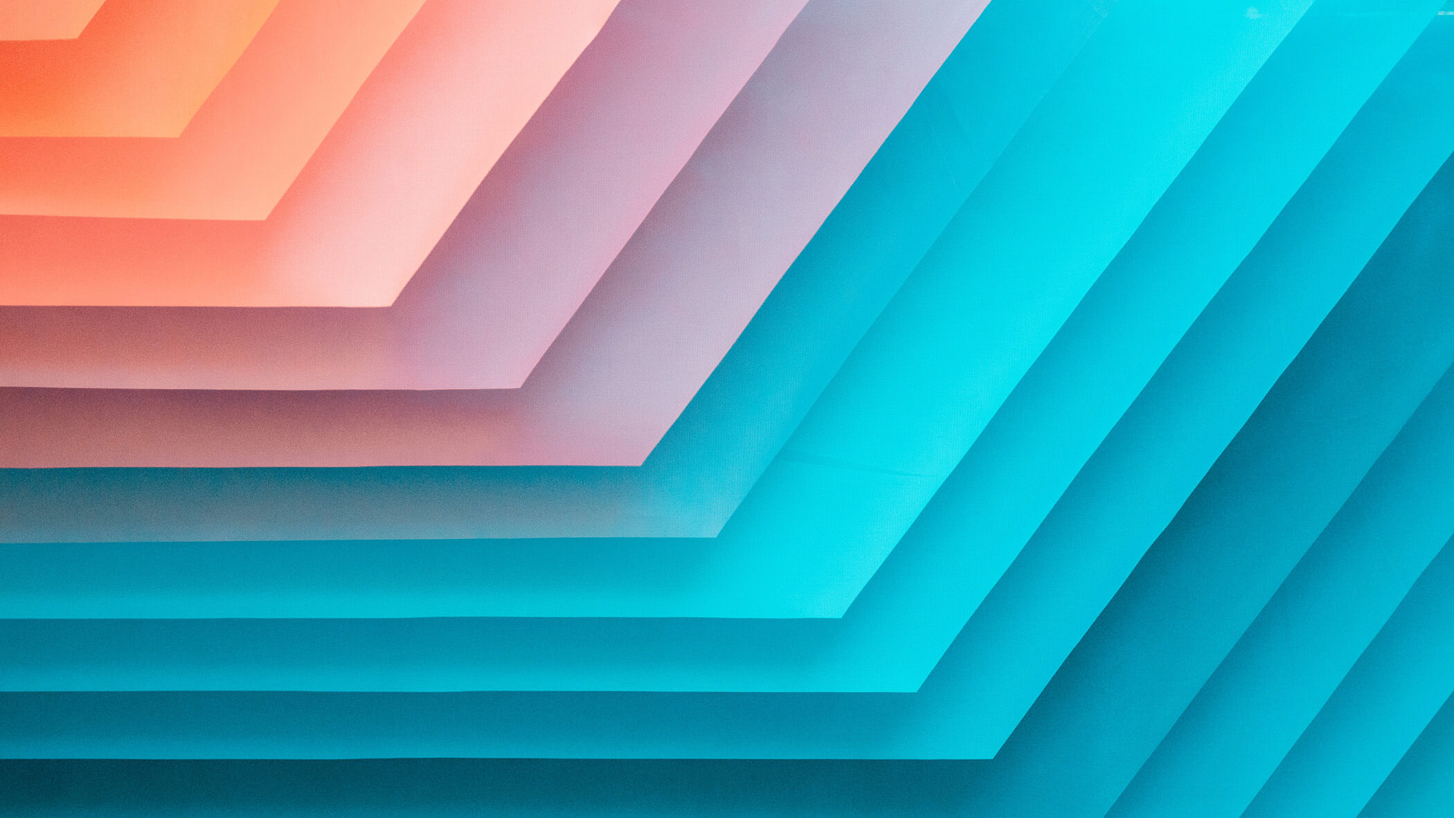 an abstract artwork of layered sheets, gradiated from a peach color in the upper left down towards a bright blue in the lower right