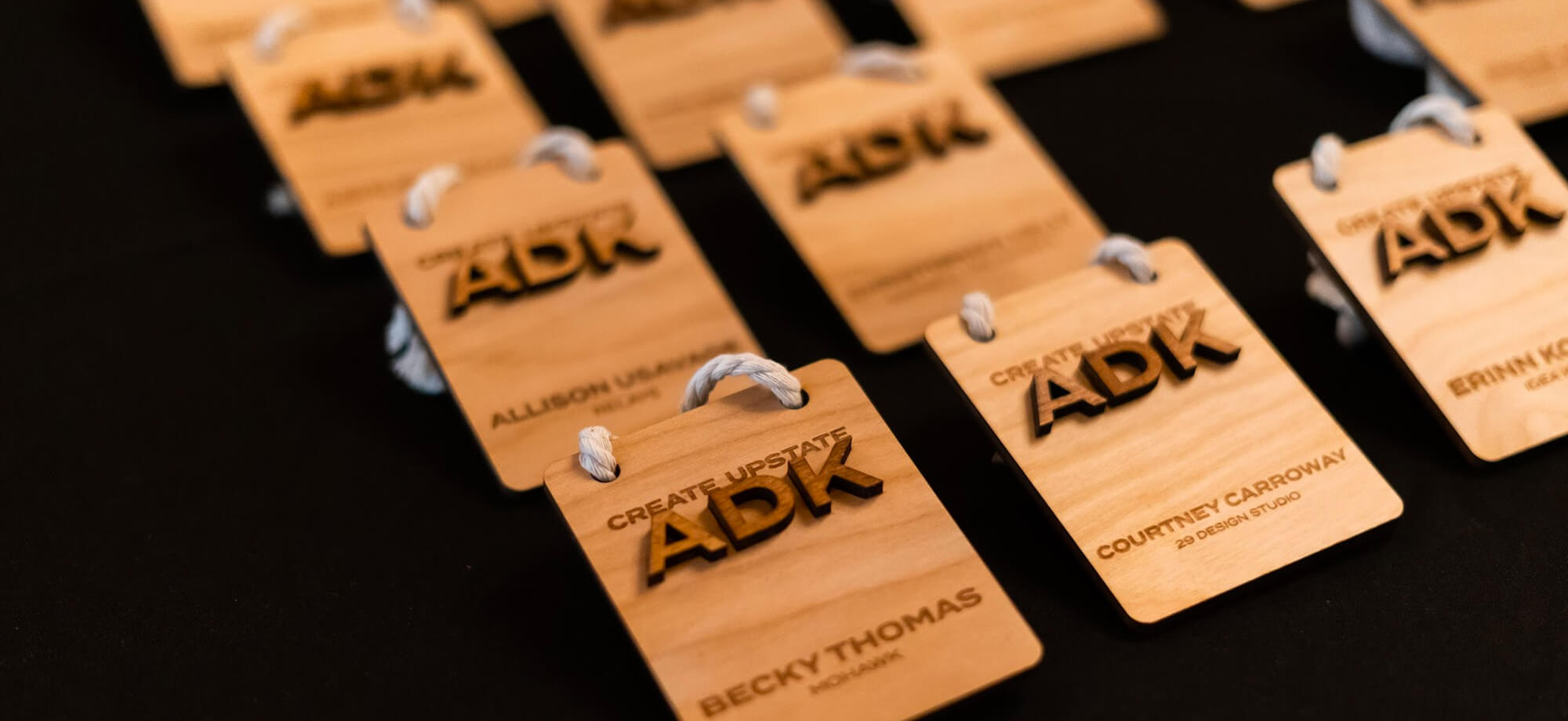 ADK nametags on table
