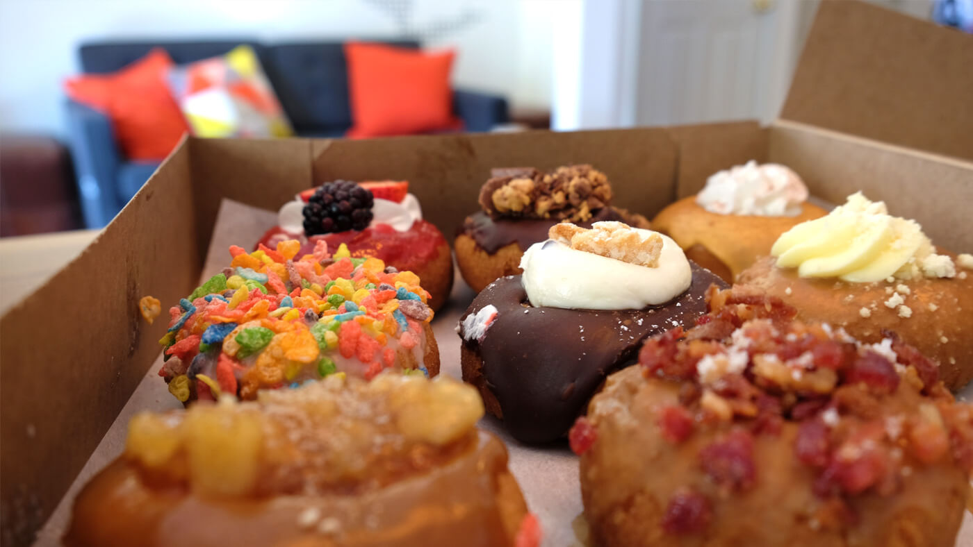 a colorful box of donuts